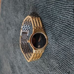 Movado Women's Watch with Gold-tone and Black Dial.